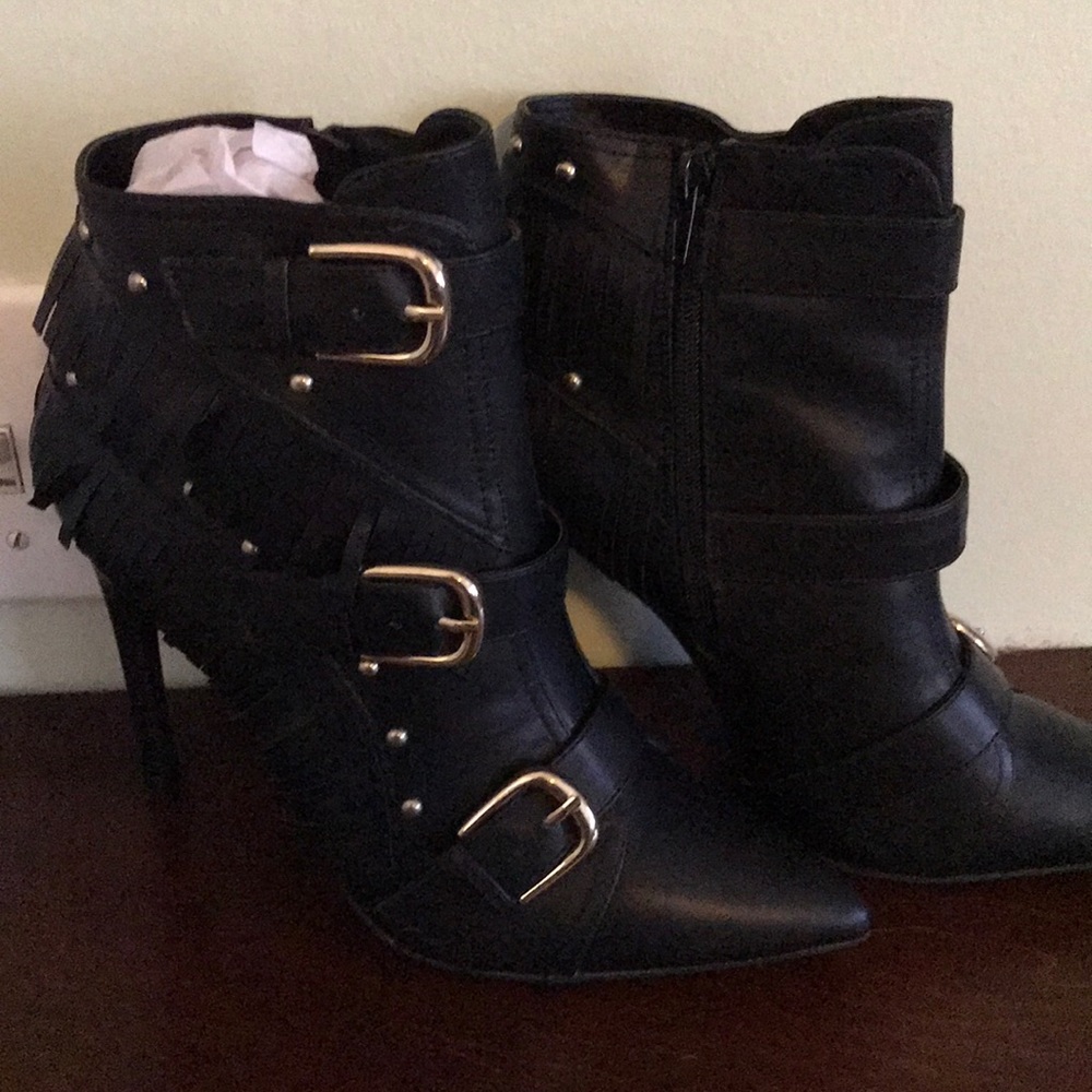 Brand new Heeled boots